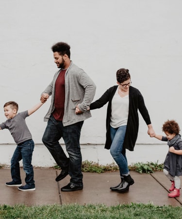 picture of a family dancing together